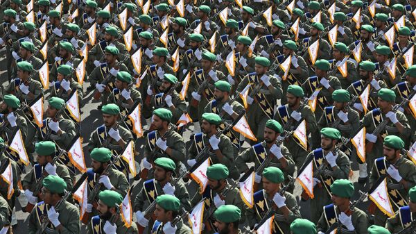 Iran's paramilitary Revolutionary Guard troops march during a military parade commemorating the anniversary of the start of the 1980-88 Iraq-Iran war, in front of the shrine of the late revolutionary founder Ayatollah Khomeini, just outside Tehran, Iran, Thursday, Sept. 22, 2022 - Sputnik International