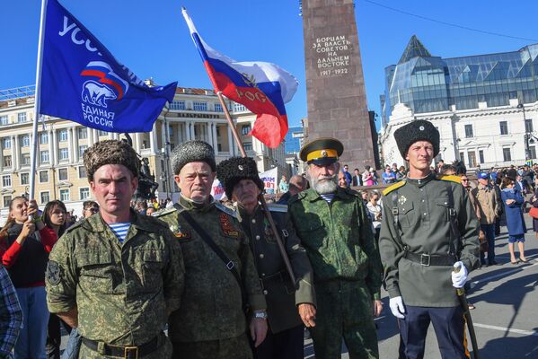 Cossacks take part in a rally in Vladivostok in support of the residents of the liberated territories in Donbass and Ukraine. The People&#x27;s Republics of Donetsk and Lugansk, and the Zaporozhye and Kherson regions are holding referendums on joining Russia on September 23-27. - Sputnik International
