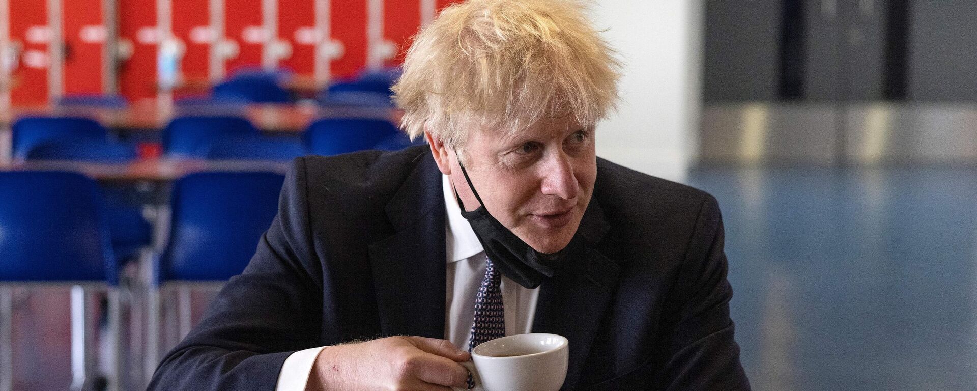 Britain's Prime Minister Boris Johnson, holds a cup of coffee as he speaks with pupils after taking part in a science lesson at King Solomon Academy in London, on April 29, 2021.  - Sputnik International, 1920, 21.10.2022