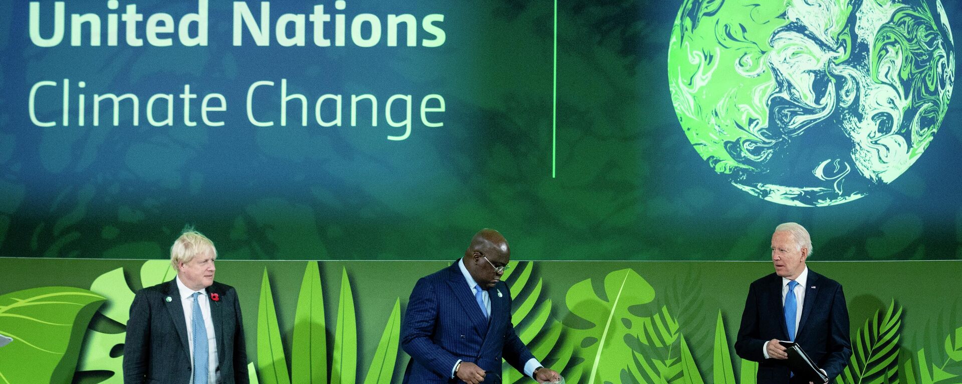 British Prime Minister Boris Johnson, President of Congo Felix Tshisekedi and President Joe Biden stand before speaking at a session on Action on Forests and Land Use, during the UN Climate Change Conference COP26 in Glasgow, Scotland, Tuesday, Nov. 2, 2021.  (Erin Schaff/The New York Times via AP, Pool) - Sputnik International, 1920, 25.10.2022