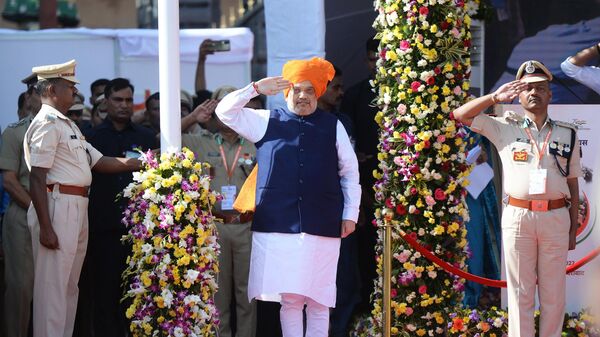 India's Union Home Minister Amit Shah (C) salutes during India's the national anthem during Hyderabad Liberation Day celebrations in Secunderabad on September 17, 2022. - Sputnik International