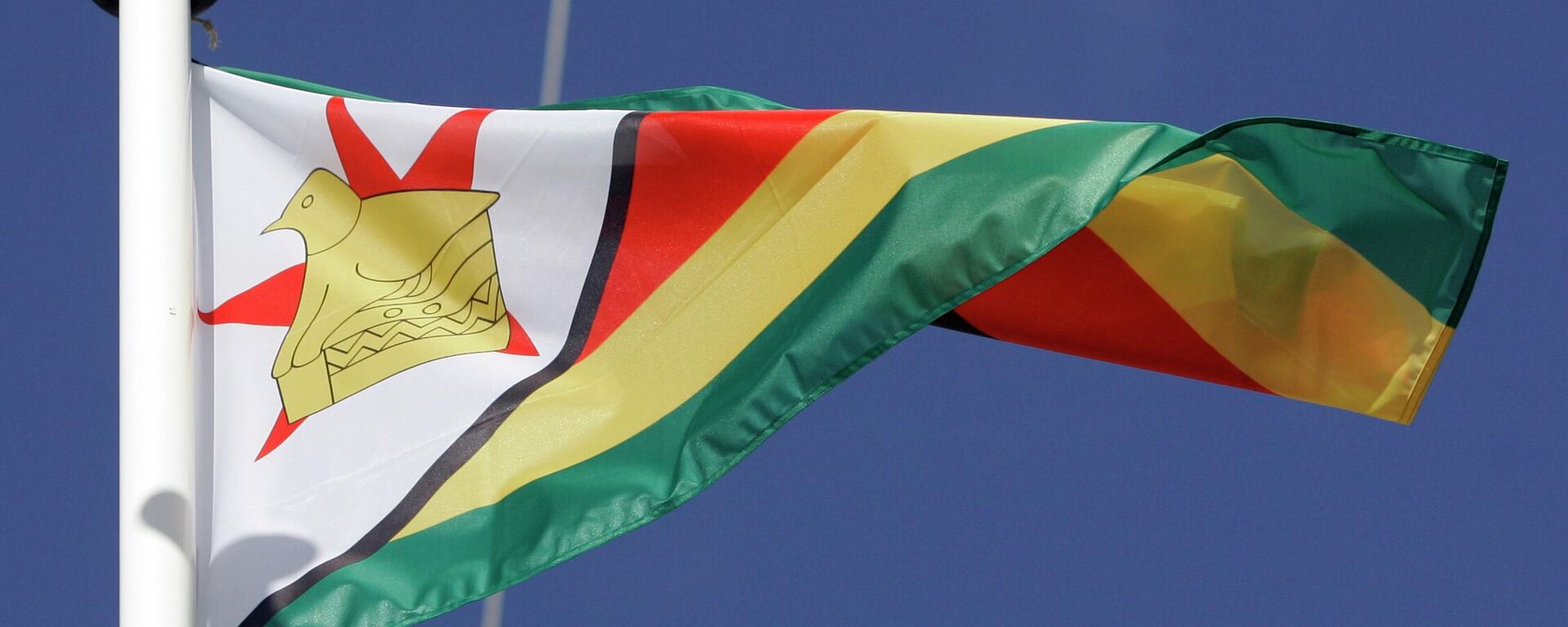 The flag of Zimbabwe blows in the win - Sputnik International, 1920, 05.11.2022