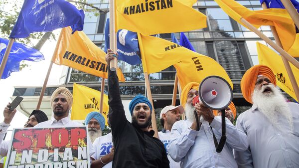 Kashmiris and pro Khalistan Sikhs demonstrate during a march and rally to protest Indian Prime Minister Narendra Modi's decision to strip Kashmir of its special status and the continuous occupation of Punjab, Thursday, Aug. 15, 2019, in New York - Sputnik International