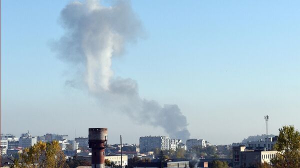 Smoke rises above buildings in the western Ukrainian city of Lvov - Sputnik International