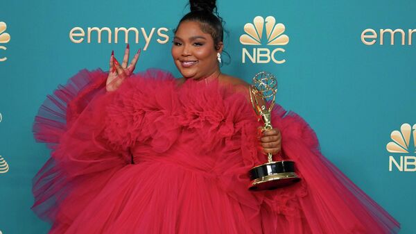 Lizzo poses in the press room with the award for outstanding competition program for Lizzo's Watch Out For The Big Grrrls at the 74th Primetime Emmy Awards. - Sputnik International