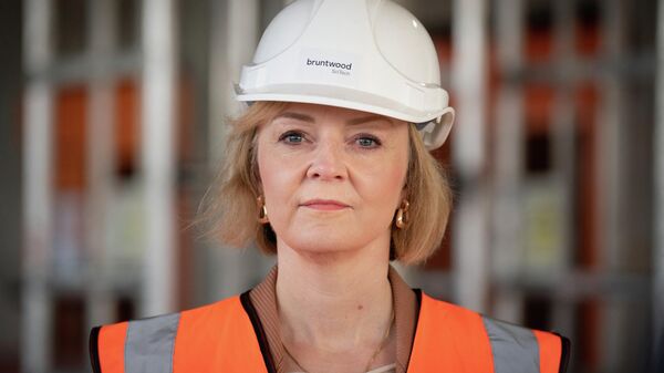 Britain's Prime Minister Liz Truss visits a construction site for a medical innovation campus in Birmingham, central England, on October 4, 2022 - Sputnik International