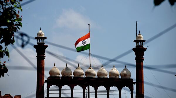 The Indian flag flies at half-mast at the historic Red Fort following Thursday’s death of Britain's Queen Elizabeth II in New Delhi, India, Sunday, Sept.11, 2022. - Sputnik International