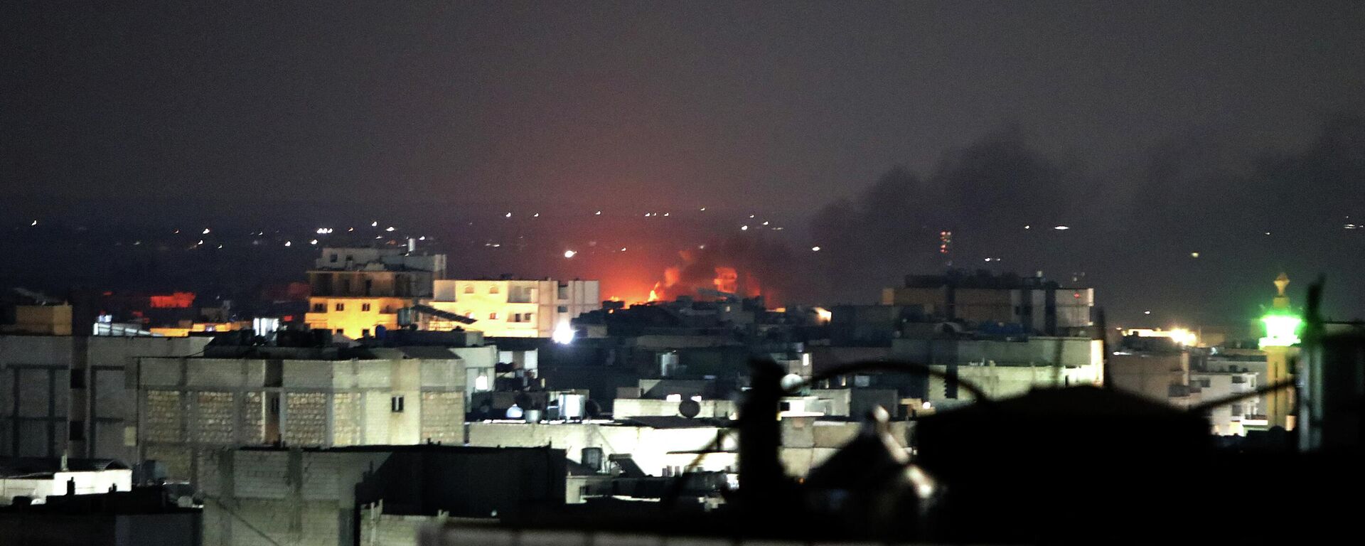 Smoke billows from an area of battles between rival Syrian factions competing for power in northwest Syria in the opposition-held town of Al-Bab, near the border with Turkey in the northern Aleppo province, on October 14, 2022. - Sputnik International, 1920, 15.10.2022