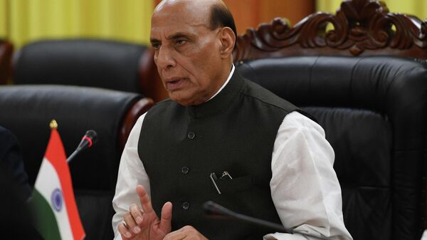 India's Defence Minister Rajnath Singh addresses a meeting with his Vietnamese counterpart Phan Van Giang at the Defence Ministry in Hanoi on June 8, 2022.  - Sputnik International