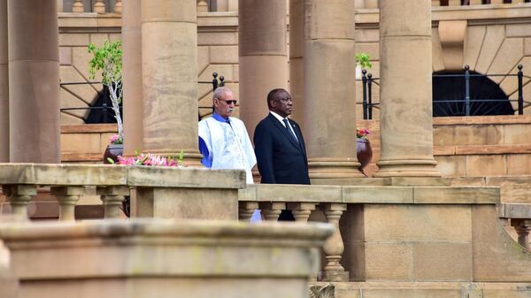 Brahim Ghali, leader of the Saharawi liberation group Polisario Front and President of the Saharawi Arab Democratic Republic (SADR), walking with South African President Cyril Ramaphosa during a visit to Pretoria on October 18, 2022. - Sputnik International