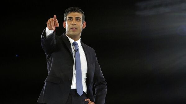 Rishi Sunak, Britain's former Chancellor of the Exchequer and a contender to become the country's next Prime Minister and leader of the Conservative party, answers questions as he takes part in the final Conservative Party Hustings event at Wembley Arena, in London, on August 31, 2022 - Sputnik International