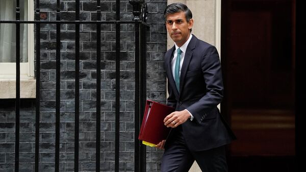 Britain's Prime Minister Rishi Sunak leaves 10 Downing Street in central London on October 26, 2022, for the House of Commons to take part in his first Prime Minister's Questions (PMQs). - Sputnik International