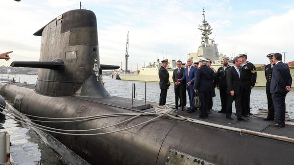 French President Emmanuel Macron (2nd L) and Australian Prime Minister Malcolm Turnbull (3rd L) stand on the deck of HMAS Waller, a Collins-class submarine operated by the Royal Australian Navy - Sputnik International