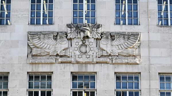 A coat of arms from 1927 reads Nation shall speak peace unto Nation on the facade of the BBC Headquarters at Broadcasting House in central London on October 6, 2022. - Sputnik International
