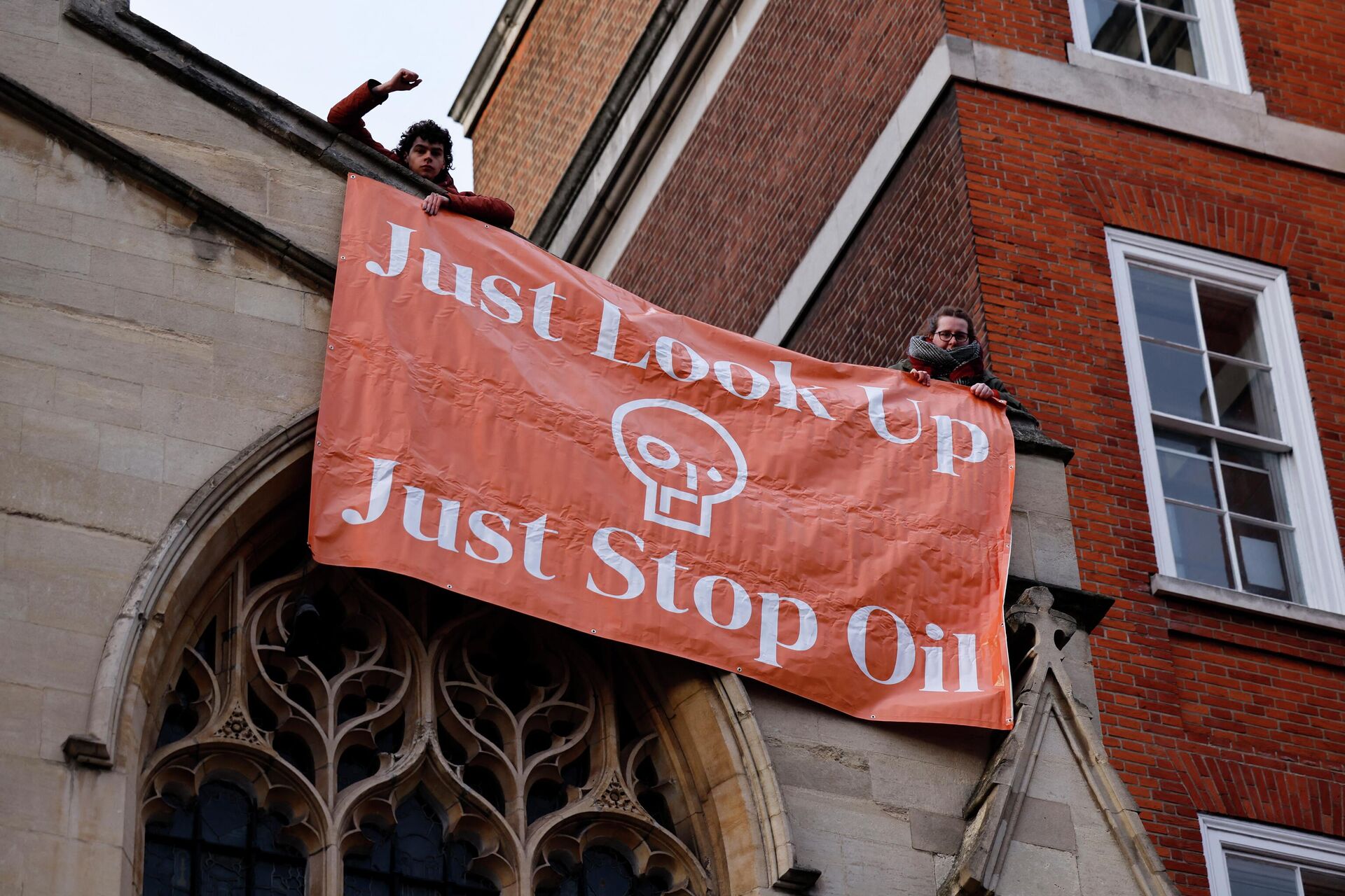 Activists from the Just Stop Oil campaign group protest against the use of oil after the arrivals for the BAFTA British Academy Film Awards at the Royal Albert Hall, in London, on March 13, 2022. - Sputnik International, 1920, 28.10.2022