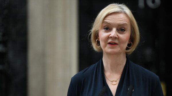 Britain's Prime Minister Liz Truss delivers a speech outside of 10 Downing Street in central London on October 20, 2022 to announce her resignation - Sputnik International