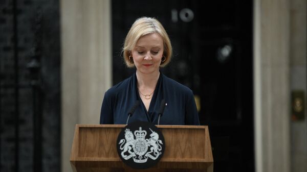 Britain's Prime Minister Liz Truss reacts as she delivers a speech outside of 10 Downing Street in central London on October 20, 2022 to announce her resignation - Sputnik International