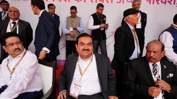 Industrialist Gautam Adani, center, sits for a group photograph during the Ground Breaking Ceremony @3.0 of the UP Investors Summit Lucknow in the northern Indian state of Uttar Pradesh, India, Friday, June 3, 2022. - Sputnik International