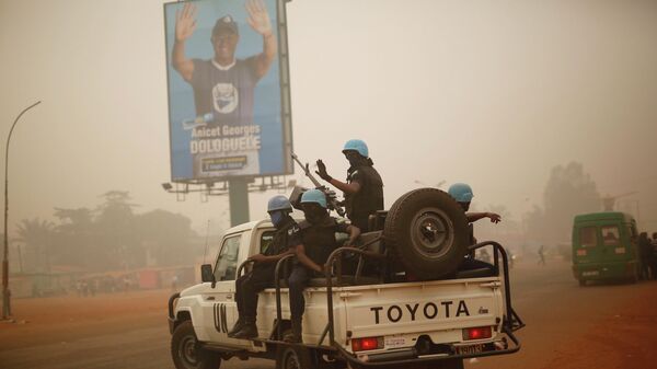 In this Feb. 12 2016 file photo, UN forces from Rwanda patrol the streets of Bangui, Central African Republic.  - Sputnik International