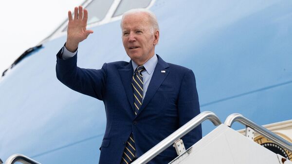 US President Joe Biden boards Air Force One prior to his departure from Cambodia's Phnom Penh International Airport on November 13, 2022 - Sputnik International