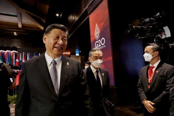 China&#x27;s President Xi Jinping walks as he attends a session at the G20 Leaders&#x27; Summit, in Nusa Dua, Bali, Indonesia, Wednesday Nov. 16, 2022.  - Sputnik International