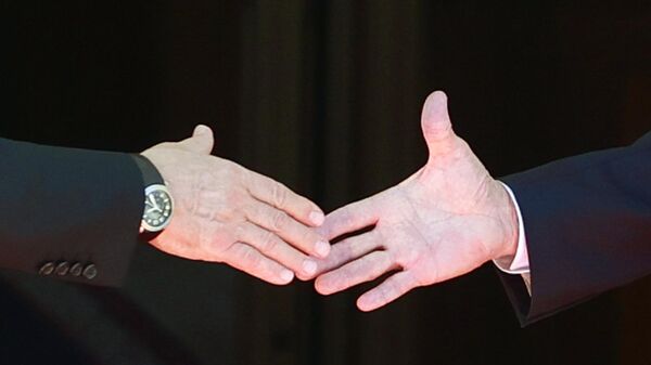 A view of the handshake between U.S. President Joe Biden, right and Russia's President Vladimir Putin, prior to the U.S.-Russia summit, in Geneva, Switzerland, Wednesday, June 16, 2021.  - Sputnik International