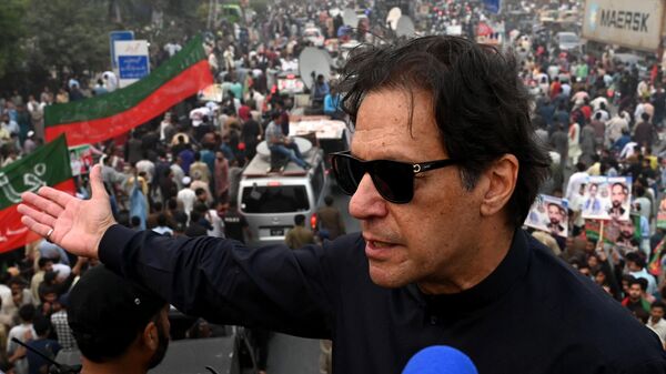 In this photograph taken on November 1, 2022, Pakistan's former prime minister Imran Khan speaks while taking part in an anti-government march in Gujranwala. - Sputnik International