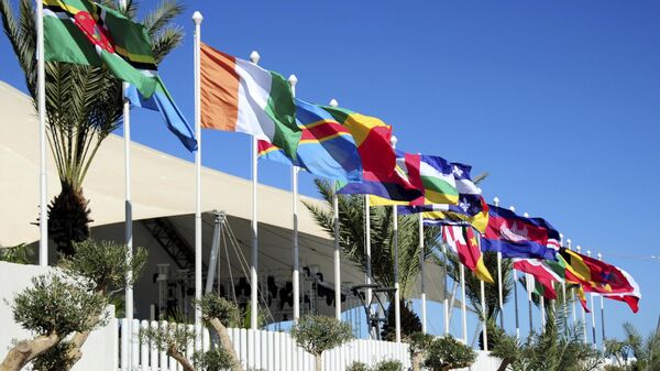 Flags of different countries wave in the wind on the eve of the 18th Francophone Summit in Djerba, Tunisia, Friday, Nov. 18, 2022. - Sputnik International