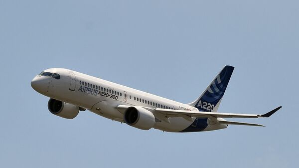 The new Airbus A220-300 flies for the first time on July 10, 2018 at the Airbus delivery center, in Colomiers southwestern France.  - Sputnik International
