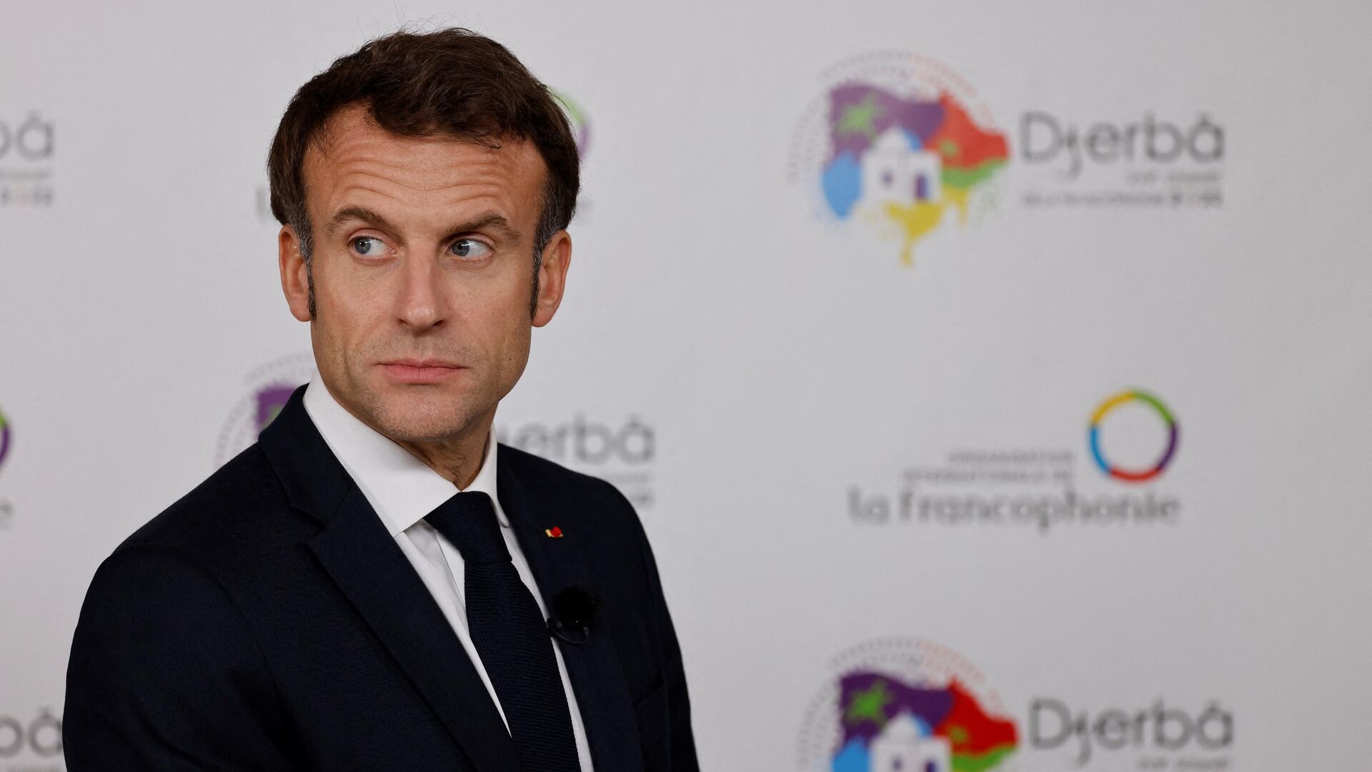 France's President Emmanuel Macron looks on during a bilateral meeting at the 18th Francophone countries Summit in Djerba, on November 19, 2022.  - Sputnik International, 1920, 21.11.2022