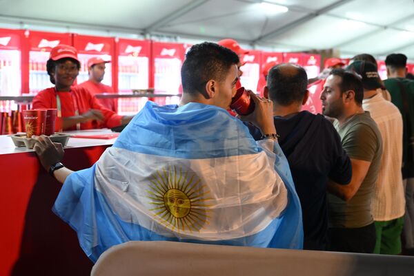 A supporter of the Argentinian team in the fan zone during the US-Wales match at the FIFA 2022 World Cup. - Sputnik International