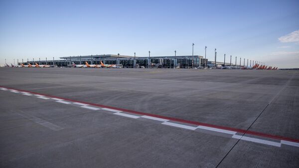 Airplanes are seen parked at the Berlin Brandenburg Airport Willy Brandt in Schoenefeld, southeast of Berlin, on November 4, 2020. - Sputnik International