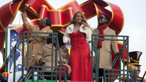 Mariah Carey waves from a float during the Macy's Thanksgiving Day Parade - Sputnik International