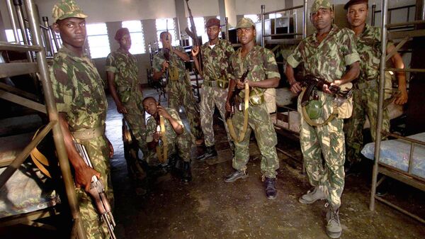 Sao Tome army soldiers are seen at the Mouro barracks, Monday, July 21 2003, the headquarters of the rebellious military that seized power in Sao Tome and Principe July 16. - Sputnik International