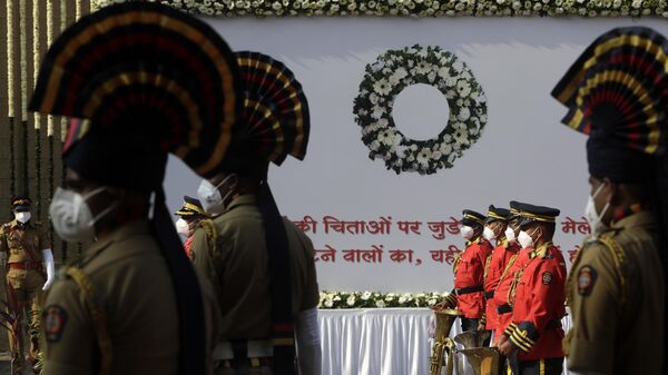 A police band pays tribute to victims of the 2008 Mumbai terror attacks on its anniversary at the police headquarters in Mumbai, India, Friday, Nov. 26, 2021.  - Sputnik International