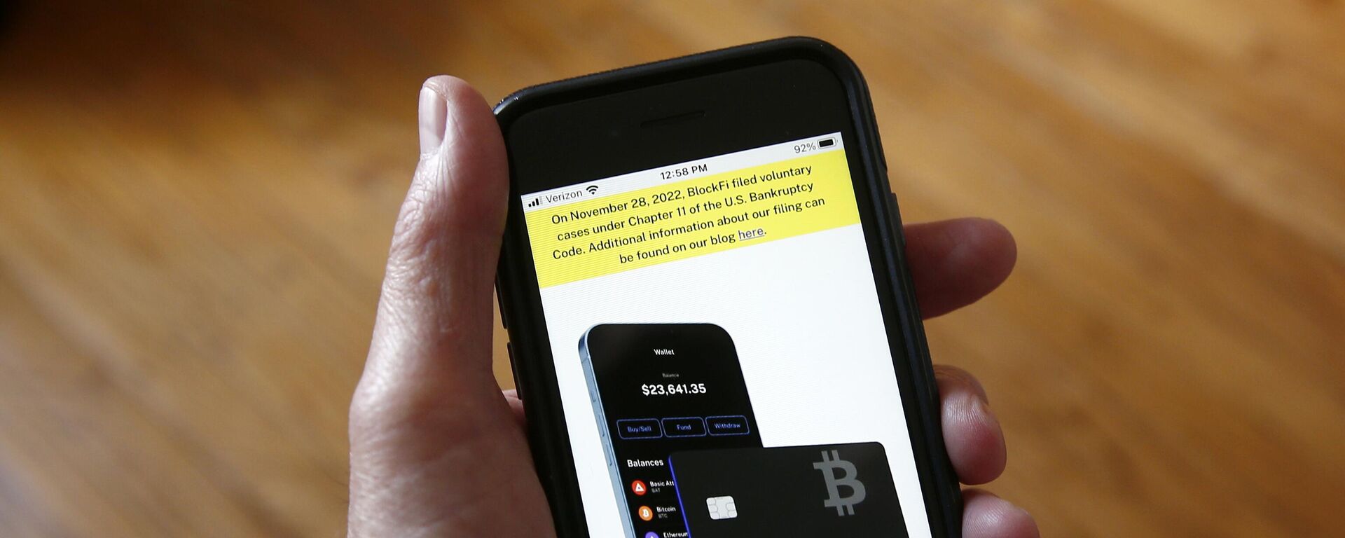 Text, in yellow, announcing cryptocurrency lender BlockFi's bankruptcy filing appears on the company website on a smart phone on Monday, Nov. 28, 2022, in New York. BlockFi said that it was filing for bankruptcy protection to stabilize its business and give it the chance to perform a restructuring. - Sputnik International, 1920, 29.11.2022