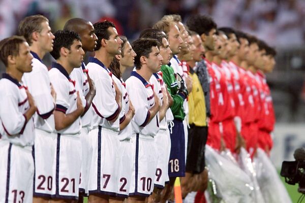 Journalists dubbed the Iran-US match at the 1998 World Cup “the most politicized game in World Cup history” and “the mother of all football matches.”Above: USA and Iran&#x27;s teams listen to their national anthems on June 21 at the Gerland stadium in Lyon, central France, before the 1998 World Cup Group F match between Iran and the United States.  - Sputnik International