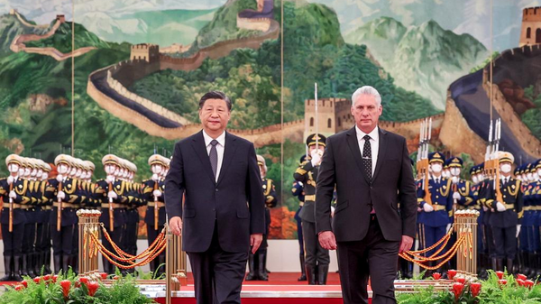 Xi Jinping, general secretary of the Communist Party of China (CPC) Central Committee and Chinese president, holds a ceremony to welcome Miguel Diaz-Canel Bermudez, first secretary of the Central Committee of the Communist Party of Cuba and Cuban president, prior to their talks at the Great Hall of the People in Beijing, capital of China, Nov 25, 2022. - Sputnik International