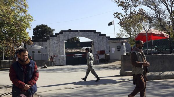 Security guards walk in front of the Pakistan Embassy in Kabul, Afghanistan, Monday, Nov. 4, 2019. - Sputnik International