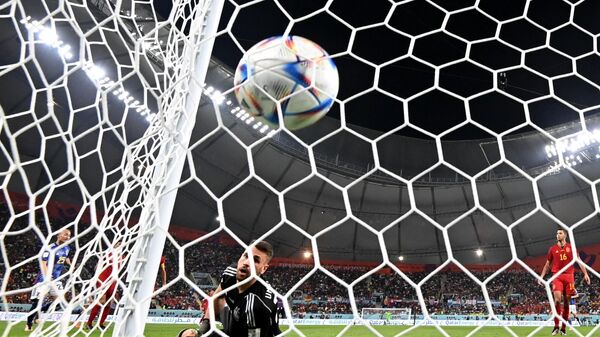 Spain's goalkeeper Unai Simon concedes a ball during the Qatar 2022 World Cup - Sputnik International