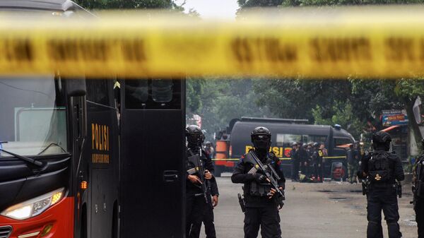 Police secure the site of a suicide bombing outside a police station at Astanaanyar in Bandung, West Java province, on December 7, 2022. - Sputnik International
