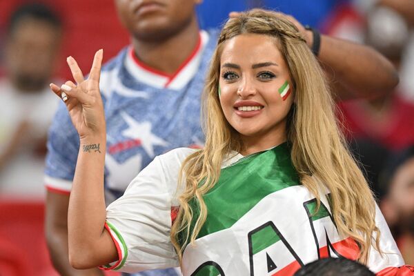 A supporter of Iran attends the Qatar 2022 World Cup Group B match between Iran and the US at the Al-Thumama Stadium in Doha on November 29, 2022. - Sputnik International