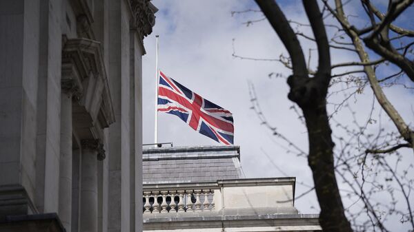 The Union Flag flies at half-mast over the Foreign, Commonwealth and Development Office in central London on April 9, 2021 after the announcement of the death of Britain's Prince Philip, Duke of Edinburgh. - Sputnik International
