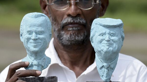 Clay sculptures of Donald Trump and Joe Biden - Sputnik International