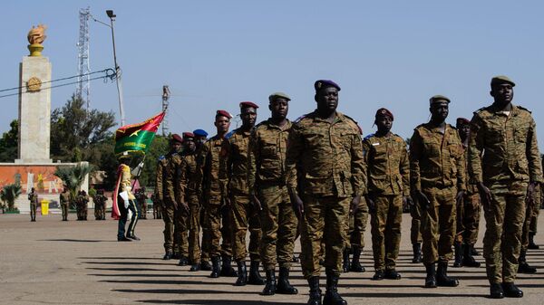 Soldiers from different army corps to be decorated with medals arrive during the 62nd anniversary of the creation of the Burkina Faso Armed Forces at the Nation Square in Ouagadougou on November 1, 2022.  - Sputnik International