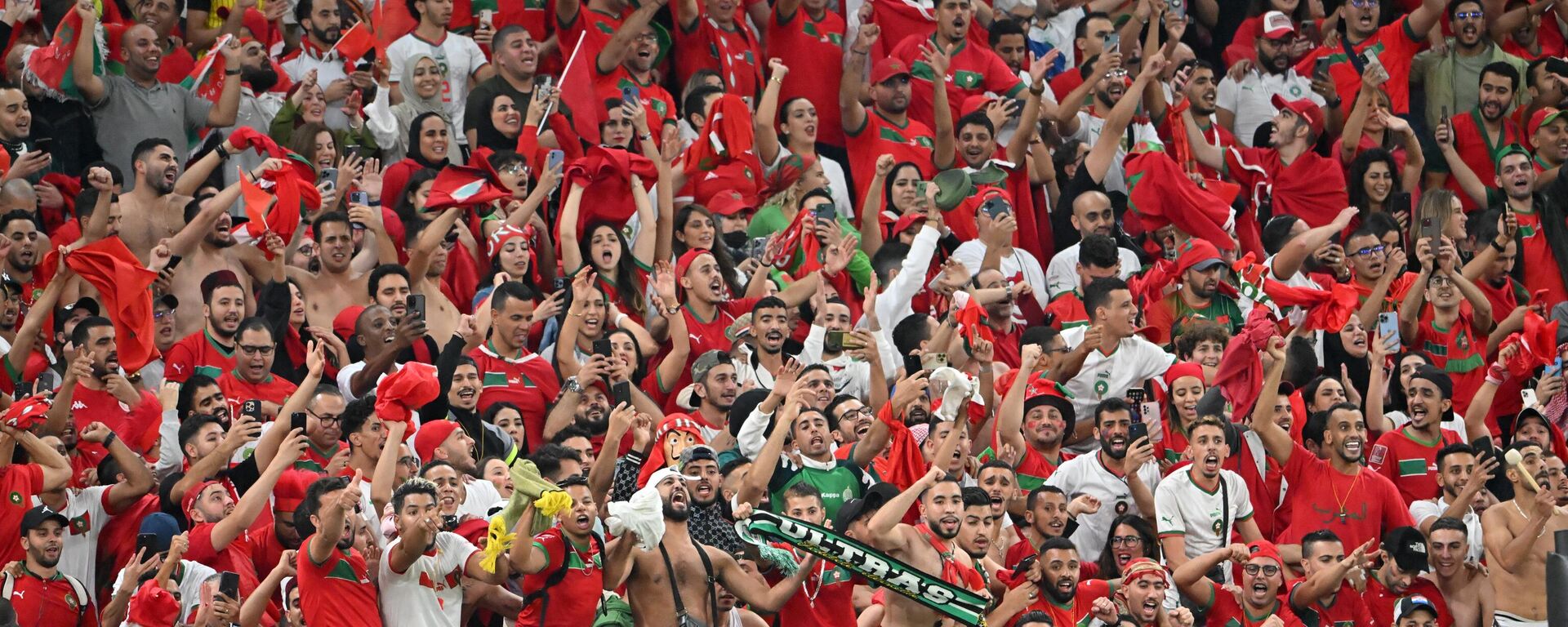 Morocco fans celebrate their team winning the Qatar 2022 World Cup quarter-final football match between Morocco and Portugal at the Al-Thumama Stadium in Doha on December 10, 2022.  - Sputnik International, 1920, 10.12.2022