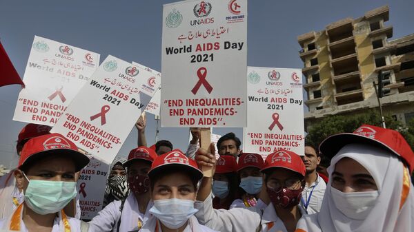Health workers participate in a demonstration to mark World AIDs Day, in Karachi, Pakistan, Wednesday, Dec. 1, 2021 - Sputnik International