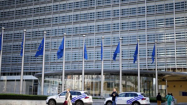 Police cars stand outside EU headquarters in Brussels. - Sputnik International