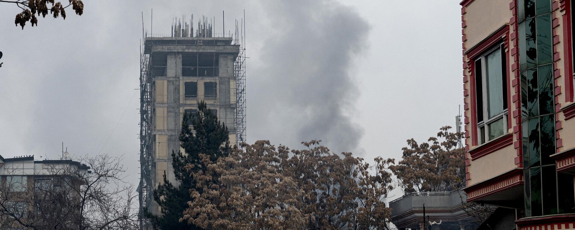 Smoke rises from a site of an attack at Shahr-e-naw which is city's one of main commercial areas in Kabul on December 12, 2022.  - Sputnik International, 1920, 12.12.2022