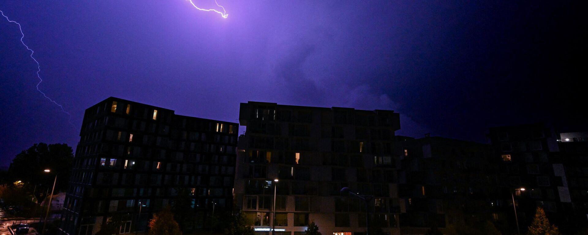 A lightning strikes during a thunderstorm in Lille, northern France on October 20, 2022.  - Sputnik International, 1920, 13.12.2022
